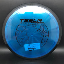 Load image into Gallery viewer, Blue Tesla disc golf disc on a dark surface